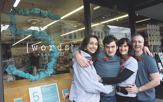 Jonah Zimiles and his wife, Ellen, on right, with their daughter Liz and son Daniel outside the bookstore.     