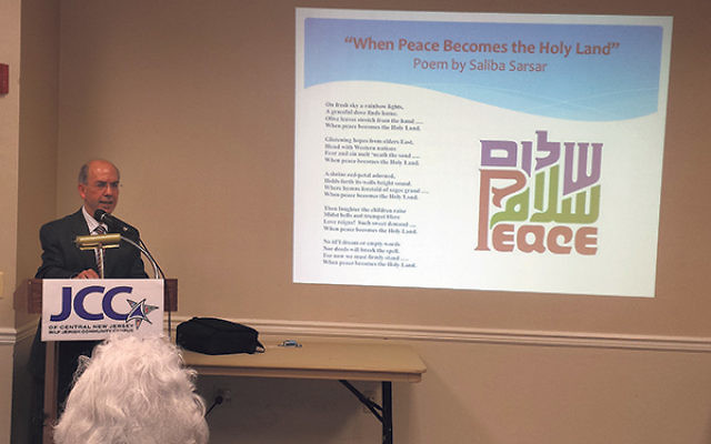Speaking at the JCC of Central NJ, Monmouth University professor Saliba Sarsar shares one of his poems about “peace in the Holy Land.” 