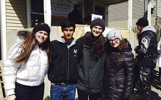 Four Sandy Teen Fellows turned out for the March 26 launch of Sea Bright Rising’s campaign to rebuild several houses damaged by Hurricane Sandy, from left, Clara Eskwitt, Ben Cooper, Hannah Stamer and Katie Eskwitt.  &#8;