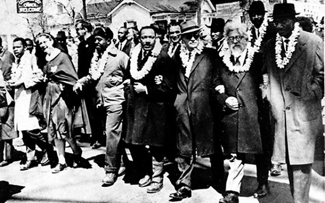 Rabbi Abraham Joshua Heschel, second from right, marches at Selma with Martin Luther King Jr. and other civil rights leaders.     