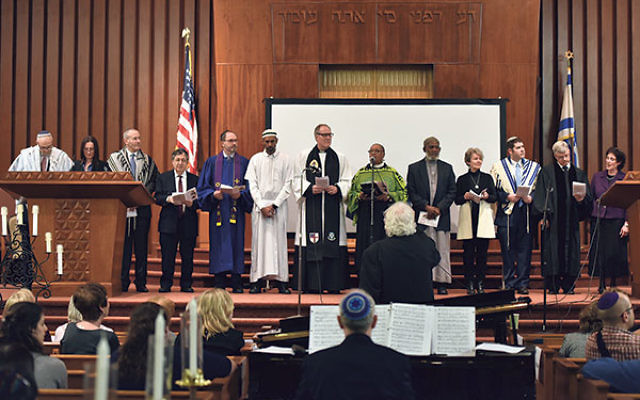 Faith leaders take part in the May 1 Interfaith Holocaust Remembrance service at Oheb Shalom Congregation.    