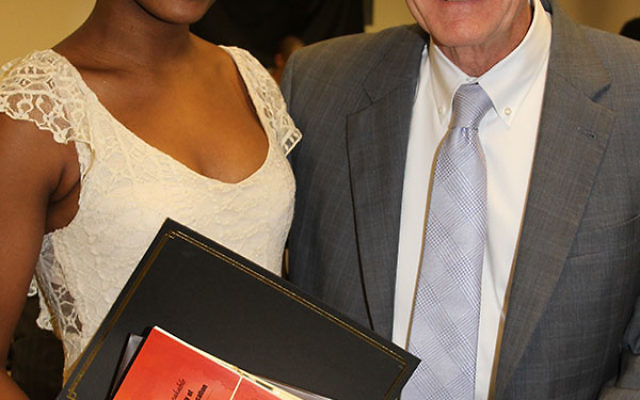 Princeton High School student Jamaica Ponder received an Upstander Award from Lawrence Glaser, executive director of the NJ Commission on Holocaust Education.