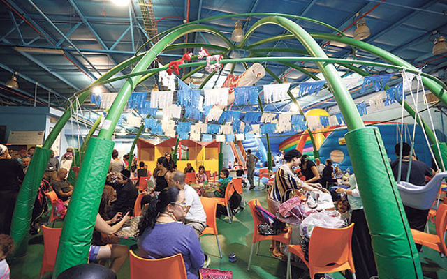 Mission members visited a bomb shelter in Sderot that doubles as a year-round playground. 
