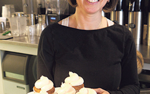 Owner Michelle Retik displays her grain-free cupcakes.