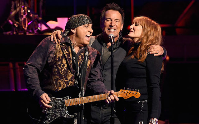 Steven Van Zandt, left, Bruce Springsteen and Patti Scialfa of Bruce Springsteen and the E Street Band performing at the Los Angeles Sports Arena, March 15, 2015. (Kevin Winter/Getty Images)