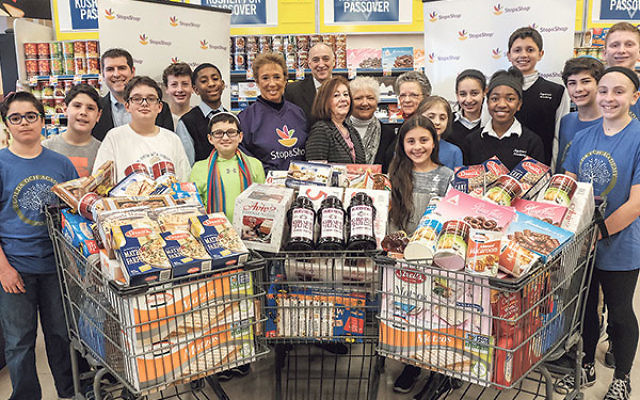 Local officials, clergy, and school children joined Stop & Shop representatives at the store on Valley Street in South Orange to celebrate the donation of one ton of kosher-for-Passover food to the Bobrow Kosher Food Pantry. 