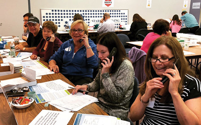 Volunteers from Solomon Schechter Day School of Greater Monmouth County in Marlboro make calls on Super Sunday. Photos courtesy Jewish Federation in the Heart of NJ 