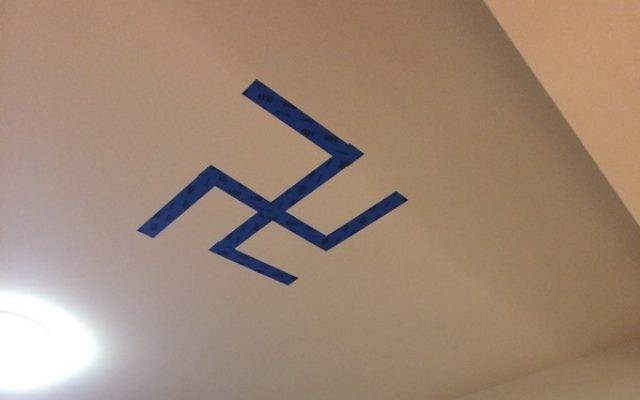 Sara Rosen returned to her student apartment at Rutgers University to find this swastika, put up by her roommates, on her ceiling. Photo  courtesy of Sara Rosen 