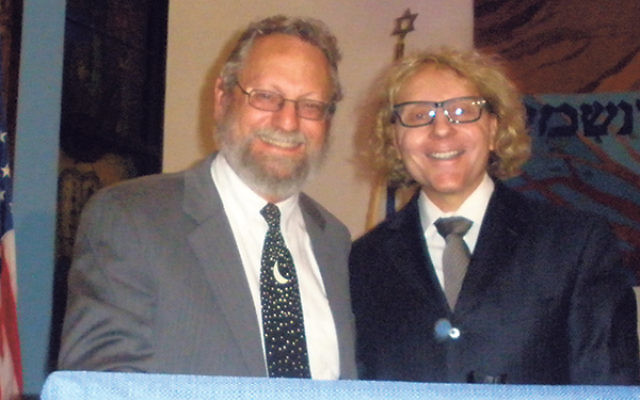 Thane Rosenbaum, right, spoke about the rise of anti-Semitism and the growing threat of Muslim extremism; with him is Congregation B’nai Tikvah’s Rabbi Robert Wolkoff. 