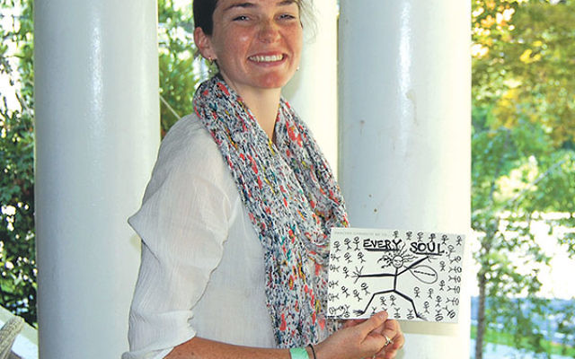 Dancer Casey Thorne uses written cards from her dancers and audience members.