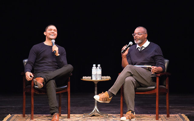 Trevor Noah, left, host of “The Daily Show,” answers questions from Chris Jackson, about his autobiography, “Born a Crime,” at the opening event of the Montclair Literary Festival. Photo courtesy of Tony Turner Photography