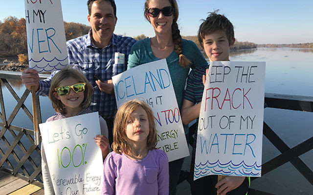 Jenny Ludmer and her family protested fracking at the Delaware River Basin. She is pictured with her husband, Phil, and, from left, Lily, Jocelyn, and Justin.  Photo courtesy Jenny Ludmer