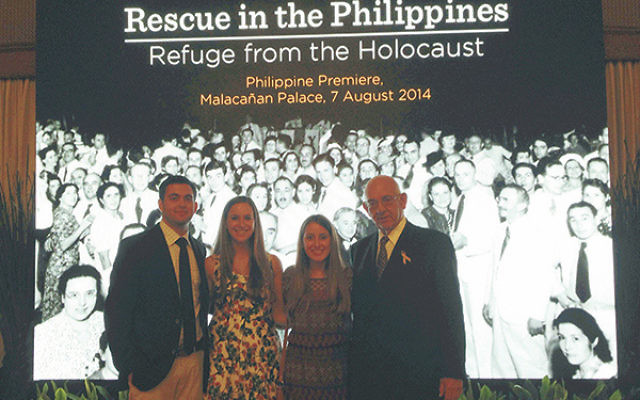 Dick Frieder, far right, and his grandchildren, from left, Steven Wilf, Lizzie Frieder, and Laura Conn, at the premiere of Rescue in the Philippines at Malacanang Palace in Manila.