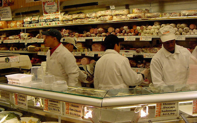Employees working in Zabar’s meat department (Wikimedia Commons)