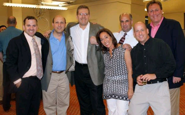 The JCC of Central NJ building committee gathered at the June 9 annual meeting, from left, executive director Barak Hermann, Steve Needle, Jeff Silverstein, Lesley Black-Vogel, Idan Levin, Mitch Harris, and Peter Weissbrod. Photo courtesy JCC of Central