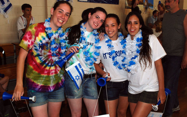 Israeli shlihot, from left, Dana Goldkorn, Itan Halfin, Hila Ehrenlieb, and Shira Yehuda are working at the JCC. Photo by Jeremy Enda