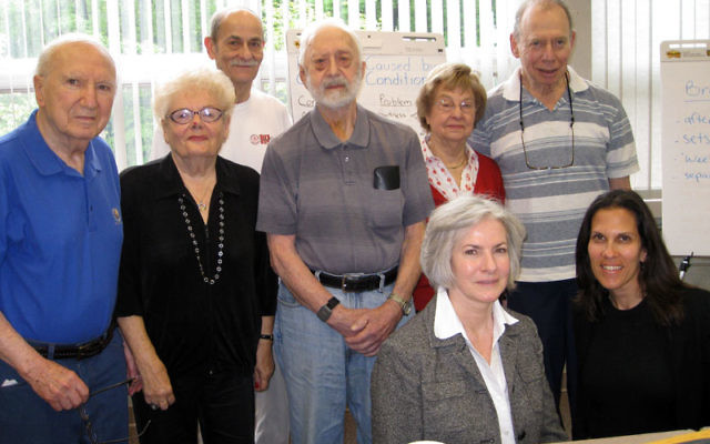 Trainers Lois Dyer and Hedy Knapp, front, left and right, worked with JCC seniors, from left, Dr. Sy Geller, Anny Strauss, Dr. Bertram Warren, Abe Myerson, Eleanor Bouer, and Ralph Dobriner, showing them ways to manage chronic illness.