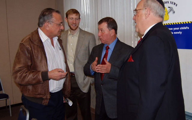 Ariel Mayor Ron Nachman, second from right, talks with, from left, Arnold Lidsky, Avie Zimmerman, and Gordon Haas.