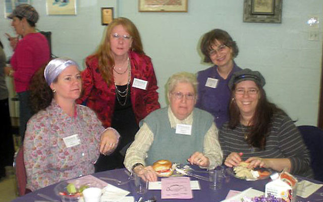 The Queen Esther Tea at the Union Y drew around 80 women, including, from left, front row, Sue Shapiro, Roberta Einhorn and her daughter, Charla Schnipper, and, back row, Shari Bates and Anita Kolat.