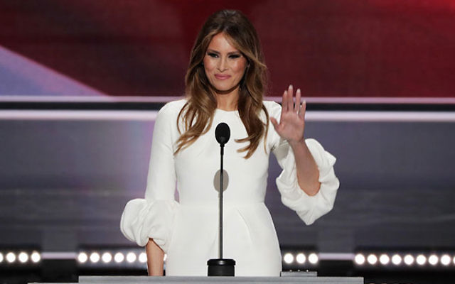 Melania Trump, wife of Republican presidential nominee Donald Trump, waving to the crowd after delivering a speech on the first day of the Republican National Convention at the Quicken Loans Arena in Cleveland, Ohio, July 18, 2016. (Alex Wong/Getty Images