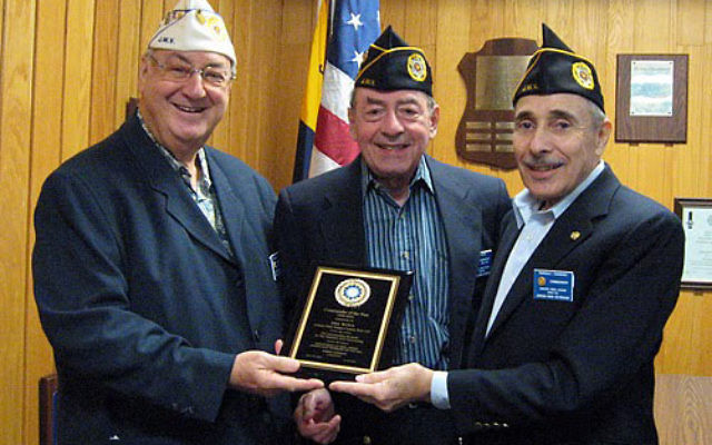Mel Woda, center, former commander of the Jewish War Veterans Asbury Park-Ocean Post 125, was chosen JWV NJ Commander of the Year. He received his award from NJ State Commander Irwin Gerechoff, left, and new Post 125 commander, Norm Ginsburg.