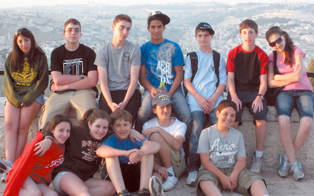 Schechter students take in the view at a promenade overlooking Jerusalem.