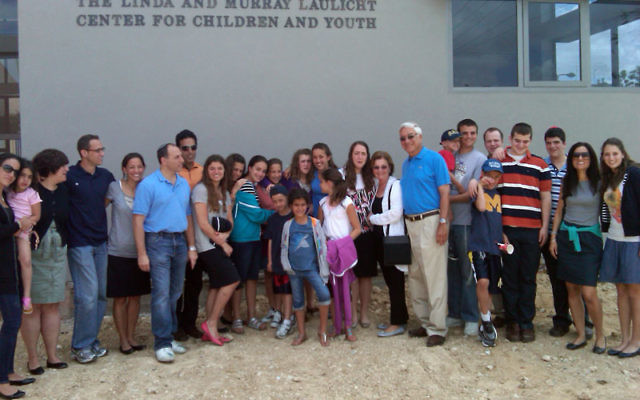 Murray and Linda Laulicht gather with their children and grandchildren at the April 20 dedication of the center named in their honor in the Negev town of Ofakim.