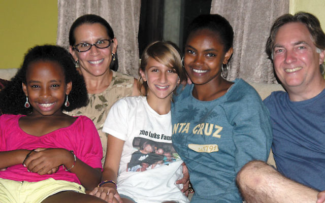 Beza Luks, second from right, who had just returned from the multi-cultural Camp Be’chol Lashon in California, with her parents JoAnna and Jonathan Luks and two of her four siblings, Sehaye, far left, and Sydney, center. Photo by Johanna Ginsberg