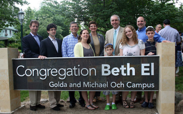 On June 5, Congregation Beth El dedicated its campus in memory of longtime member Golda Och, who died in 2010, and her husband, Michael Och, third from left. With other Och family members, including Daniel Och, far left, and Sue Och, fourth from left, are