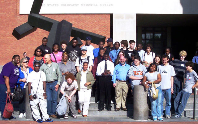 Young people from Temple Beth Shalom in Livingston, Covenant House in Newark, and Irvington High School gather in front of the U.S. Holocaust Memorial Museum in Washington.