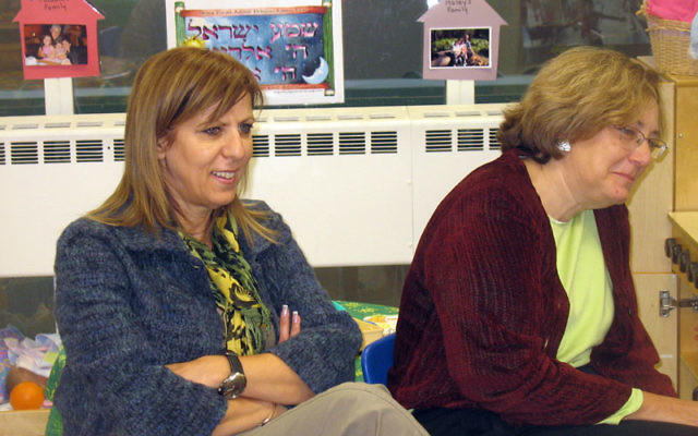 Sima Haddad Ma Yafit, left, of the Israeli Ministry of Education, and Galina Vromen, director of Sifriyat Pijama, Israel’s PJ Library program, observed a class of four-year-olds at the Cooperman JCC as part of a visiting Israeli delegation.