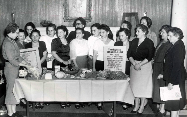 Volunteers from the Bureau of Service to the Foreign-Born, a Jewish social service agency and forerunner to JFS, instruct immigrants to Newark about the American traditions of preparing Thanksgiving dinner, circa 1950. Photos courtesy Jewish Historical