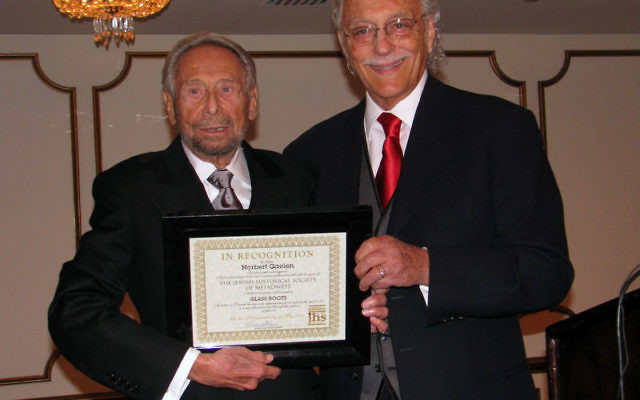 Jewish Historical Society of MetroWest cofounder Norbert Gaelen, left, receives a certificate of recognition from JHS president Howard Kiesel. Photos by Robert Wiener