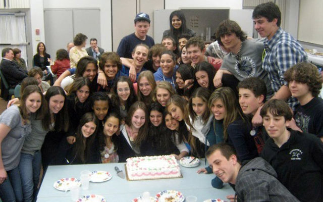 Diller teen host Sydney Hershman of Towaco, front row, third from left, celebrated her birthday at the program’s farewell dinner just before the Israeli contingent returned to Rishon Letzion. Photo courtesy Partnership for Jewish Learning and Life