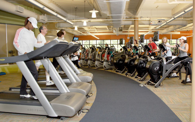 Members of JCC MetroWest’s Bildner Family Fitness and Wellness Center in West Orange work out on exercise bikes. Photo courtesy JCC MetroWest