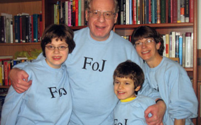 Jenny Rose, left, and her family — parents Jonathan and Gayle and sister Flora — sport the “FOJ” or “Friends of Jenny” sweatshirts that were given to guests at her bat mitzva celebration.