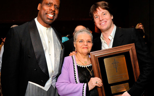 Joshua Bell, right, with Holocaust survivor Luna Kaufman, past endowment chair, and Metropolitan Opera bass Kevin Maynor.