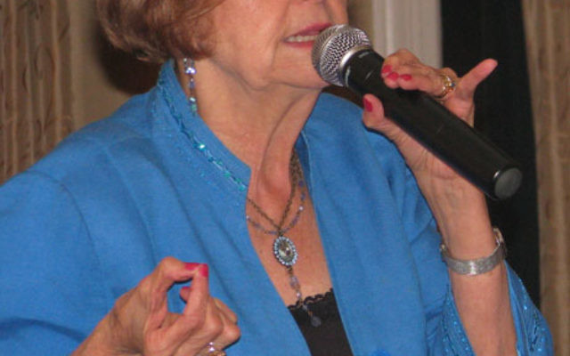 Holocaust survivor Tova Friedman details her narrow escapes from the Nazis in a speech before the Unity Club in Maplewood. Photo by Robert Wiener