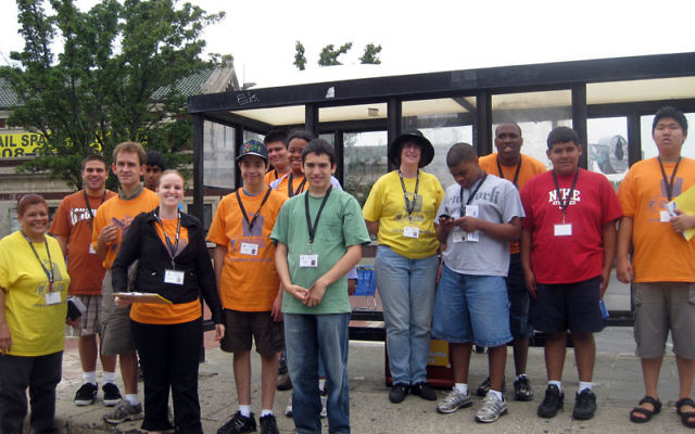 Navigating public transportation is a skill Career Campers practiced on their way to the Laurelwood Arboretum, when they took a NJ Transit Bus from Montclair to Willowbrook Mall. At the bus stop are, from left, JVS staff member Wanda Echevarria; campers