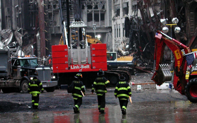 Fire fighters at Ground Zero on Sept. 20, 2001. Photo by Larry Bruce/Shutterstock
