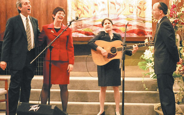 Debbie Friedman, who died over the weekend, singing and playing guitar at the 2005 installation ceremony for Rabbi Francine Roston at Congregation Beth El in South Orange.
