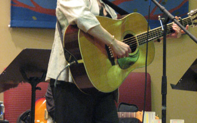 Debbie Friedman performs in a North Brunswick synagogue in 2009. Photo by Bobbi Binder