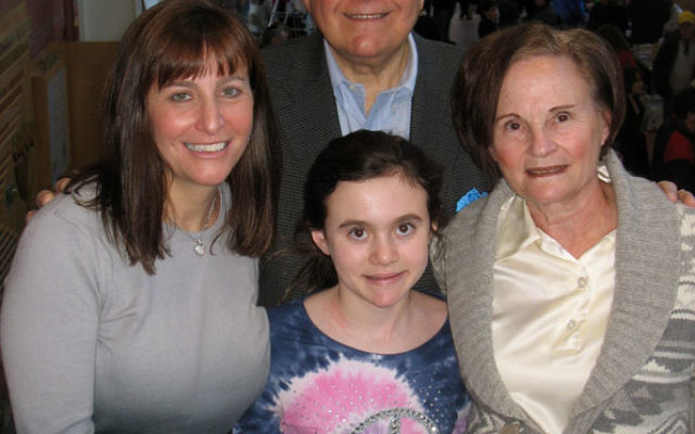 Leon and Toby Cooperman with daughter-in-law Jodi and granddaughter Courtney at Mitzvot of MetroWest, Jan. 25 on the Aidekman campus in Whippany. The Coopermans have established a family fund to support Jewish camping, Birthright Israel, and mitzva progra