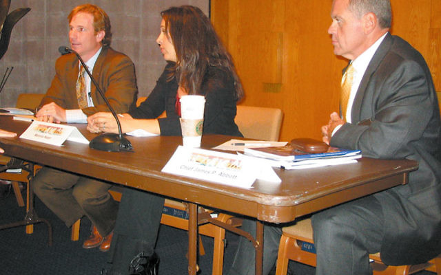 At an Oct. 3 forum on immigration sponsored by the American Jewish Committee, panelists were, from left, immigration lawyer Ryan Stark Lillienthal, Melanie Nezer of the Hebrew Immigrant Aid Society, and West Orange Chief of Police James P. Abbott. Photo