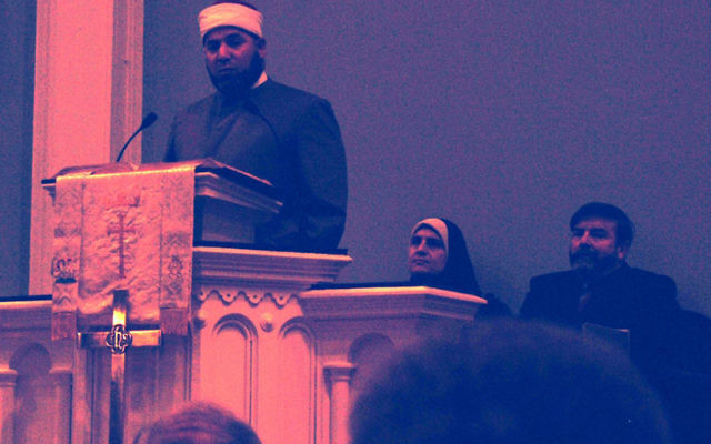 Imam Shazlei Shaban, introduced by Rabbi Mark Mallach, right, took part in the Nov. 22 interfaith service at First Presbyterian Church in Springfield. Photo by Elaine Durbach