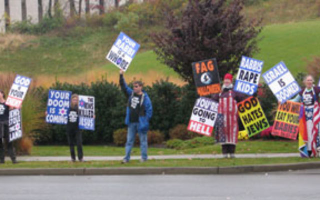 Five members of the Westboro Baptist Church picket across the street from the Leon & Toby Cooperman JCC, Ross Family Campus, in West Orange, on Oct. 27.