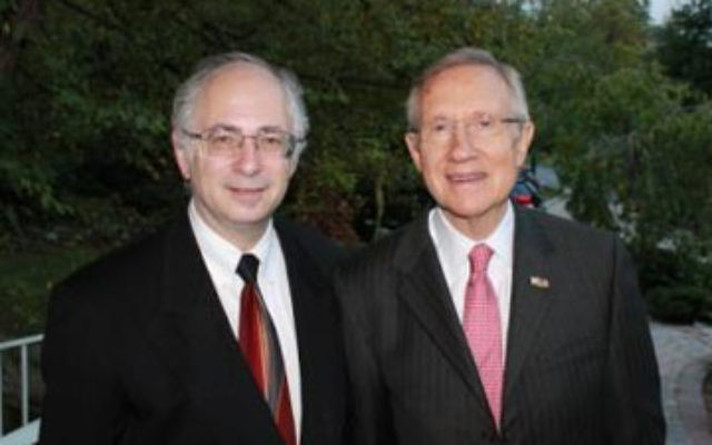 United States Senate Majority Leader Harry Reid, right, at a Sept. 19 fund-raiser in Englewood hosted by NORPAC president Ben Chouake. Photo by Karen Pichkhadze