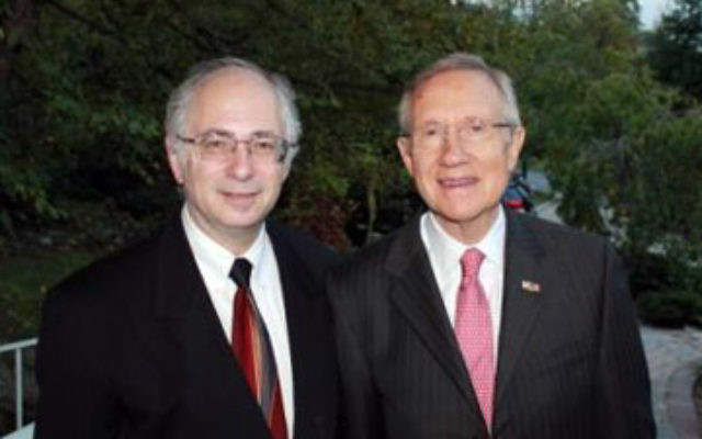 United States Senate Majority Leader Harry Reid, right, at a Sept. 19 fund-raiser in Englewood hosted by NORPAC president Ben Chouake. Photo by Karen Pichkhadze