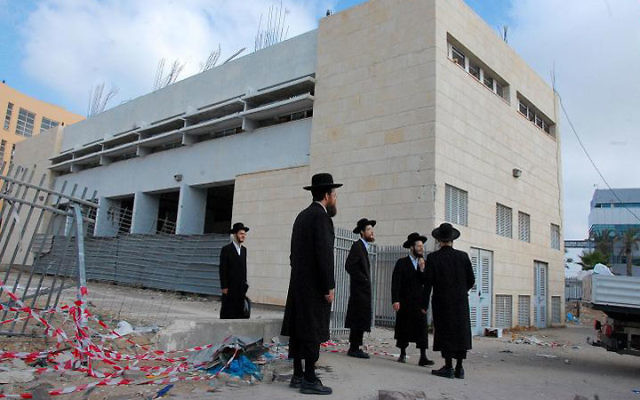 The site in Ashdod where, on Aug. 19, a Grad missile exploded within range of 900 yeshiva students and high school students beginning their school day — one of seven missiles fired from Hamas-controlled Gaza that hit Ashdod. Photo courtesy Noam Bede