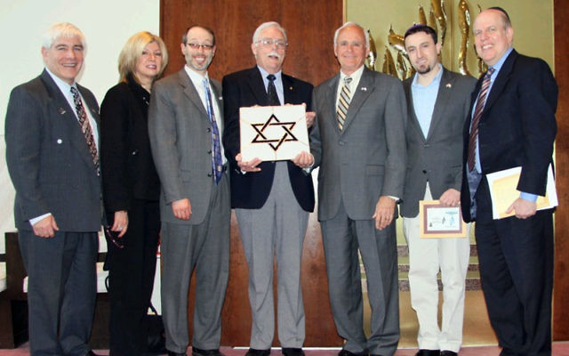 At the Salute to Friends of Israel at Congregation Brothers of Israel on March 27 are, from left, Lou Balcher, Consulate of Israel, Philadelphia; Sharon Schmidt, American Friends of Magen David Adom, Philadelphia; Rabbi Shalom Plotkin; Frank Ujfalusi, Sal
